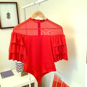 Trendy red bodysuit size Medium with ruffle detail
